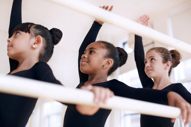 Girl (8-9) practicing ballet